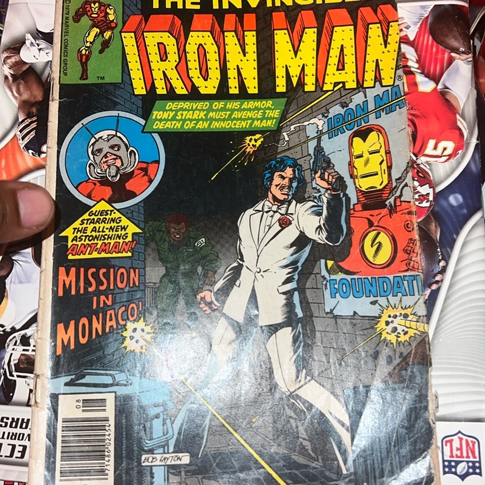 Marvel and DC comic books and old sports magazines